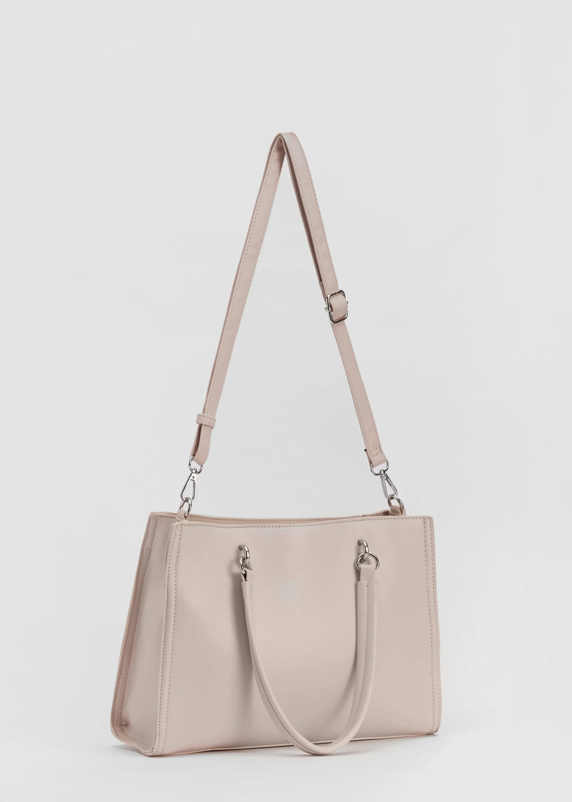 Borsa tasca asimmetrica
