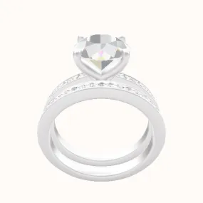 Micropave Engagement Ring With Petal Four Prong Head and Matching Band